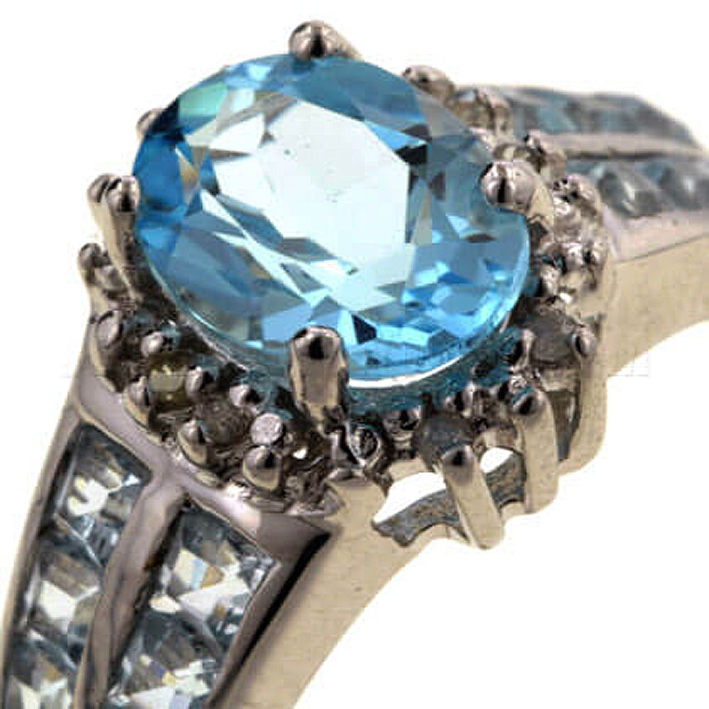 Blue Topaz 9ct White Gold Oval Shoulder Ring - Jewellery World Online